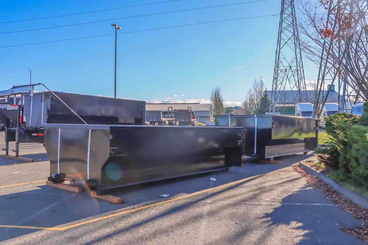 Roll-off dumpster ready for waste disposal at job site for 10 Yard Dumpster Rental in Holly Springs